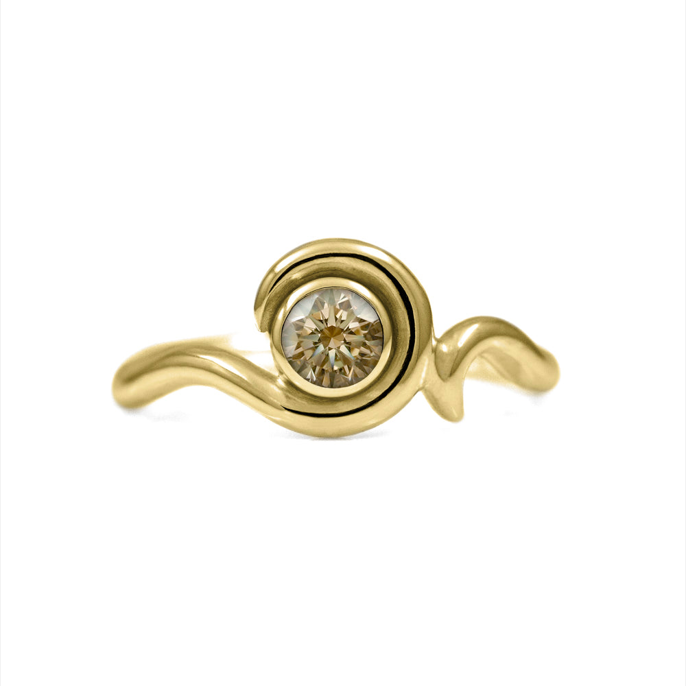 Entwine engagement ring handmade in recycled 18ct yellow gold and set with an ethically sourced natural champagne diamond. Delicate 2mm band with a 4.5mm 0.35ct diamond. Handmade in Salisbury, Wiltshire.