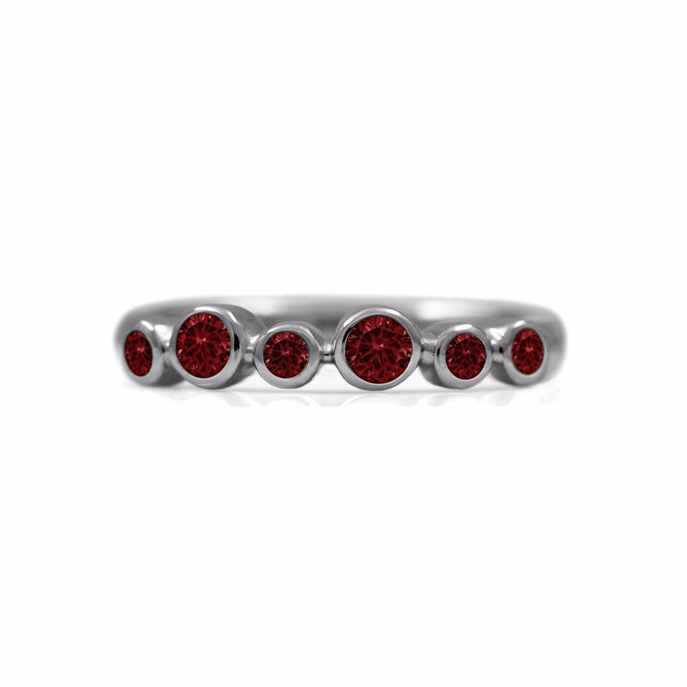 Halo half eternity ring - sterling silver and garnet