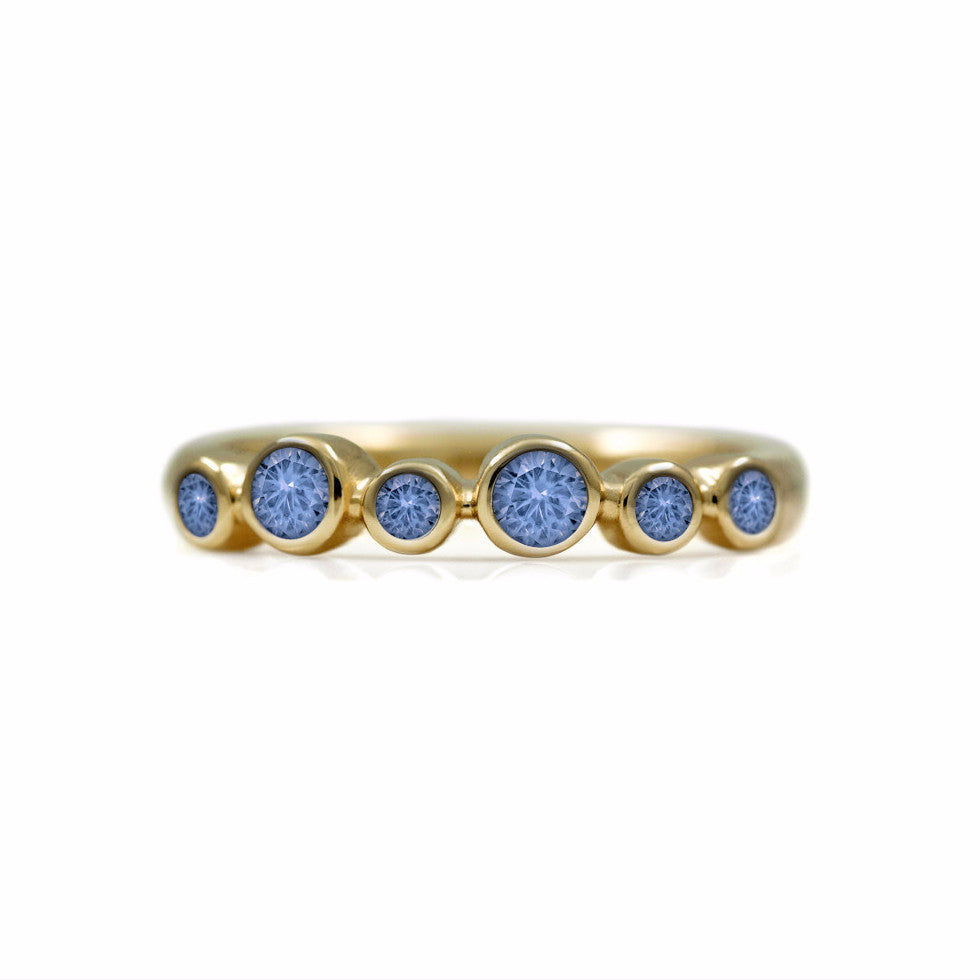 Halo half eternity ring - 9ct yellow gold and blue sapphire