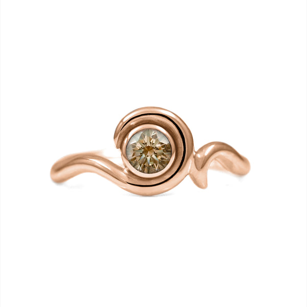 Entwine engagement ring handmade in recycled 18ct rose gold and set with an ethically sourced natural champagne diamond. Delicate 2mm band with a 4.5mm 0.35ct diamond. Handmade in Salisbury, Wiltshire. 