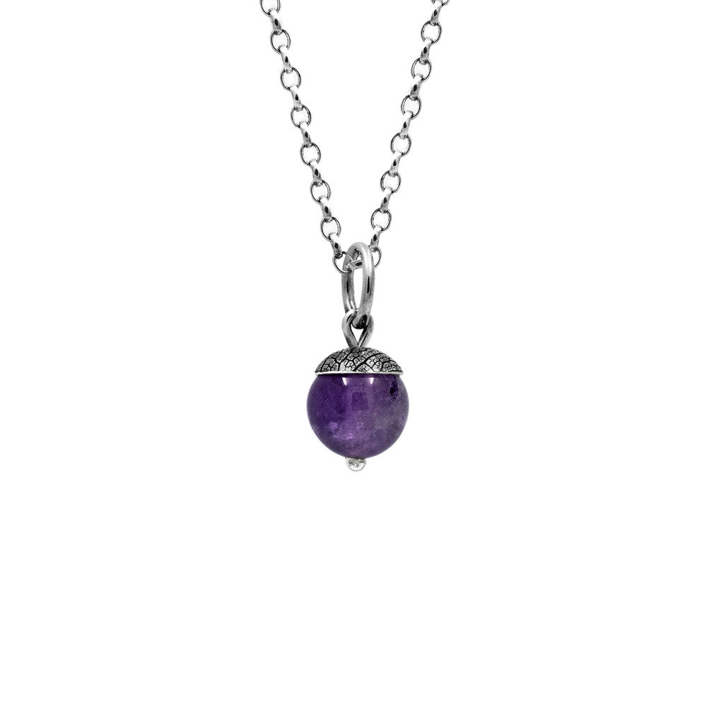 Sterling silver and purple amethyst acorn charm pendant.  Can also be worn with silver leaf pendants and silver rose pendants. Handmade using recycled silver in Salisbury, Wiltshire.