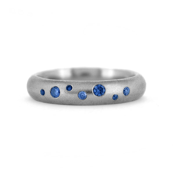 Wedding ring flush set with sapphires recycled white gold sapphire wedding band