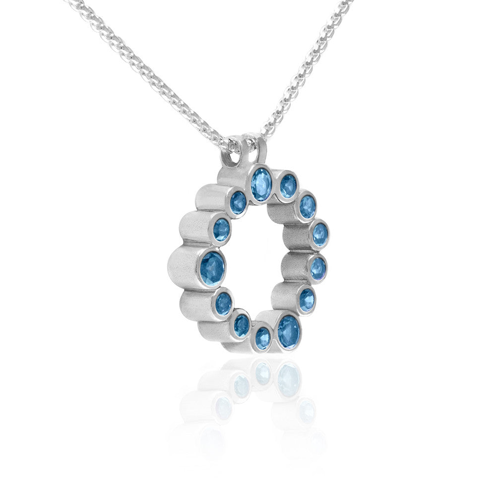 Halo pendant in sterling silver and gemstone - blue topaz