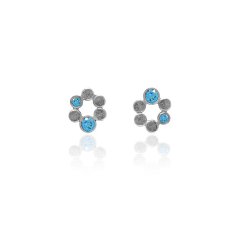 Small halo earrings in sterling silver and blue topaz - ready to wear