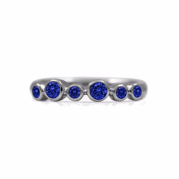 Halo half eternity ring - sterling silver and blue sapphire