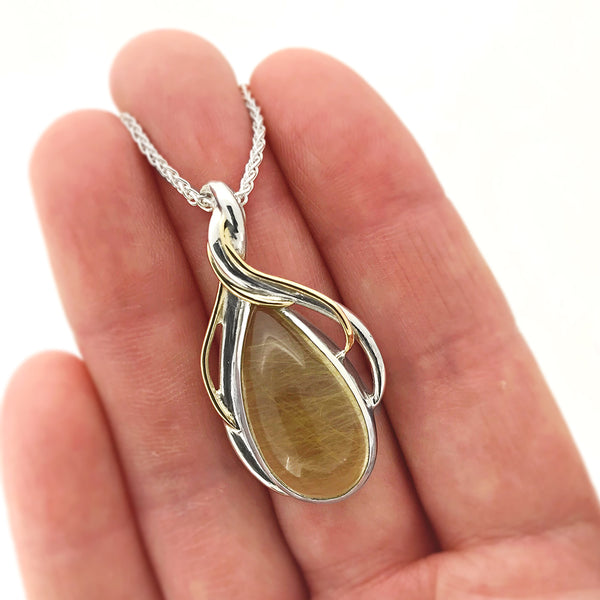 Entwine statement pendant in sterling silver, yellow gold and rutilated quartz - ready to wear