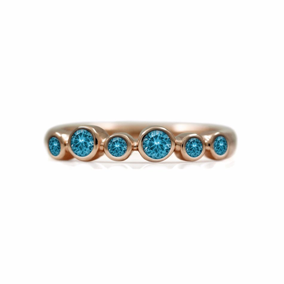 Halo half eternity ring - 9ct rose gold and blue topaz