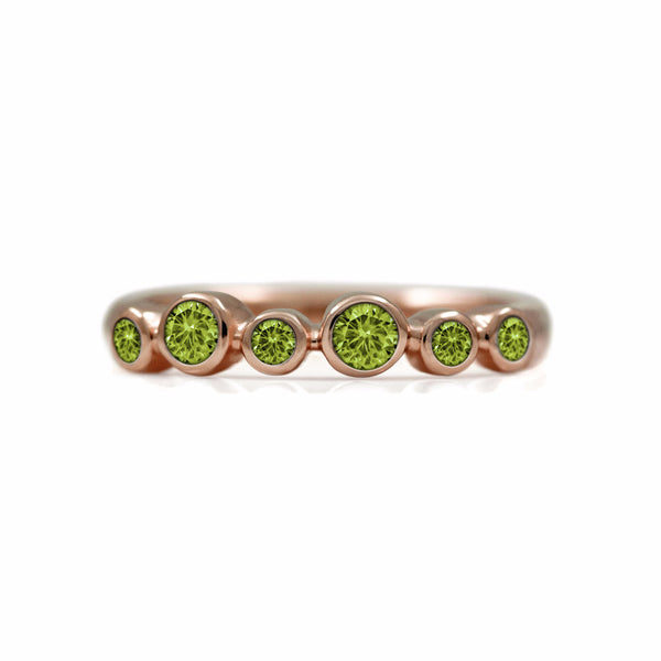 Halo half eternity ring - 9ct rose gold and peridot