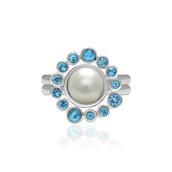 Sterling silver and blue topaz halo ring with an interlocking pearl solo ring
