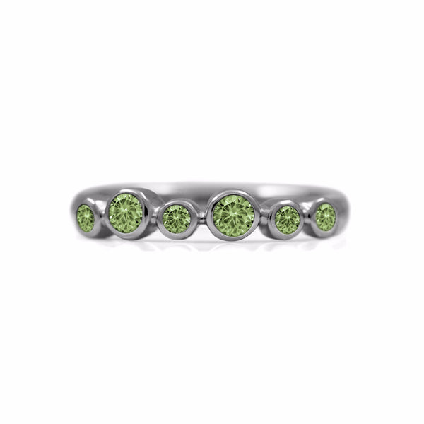 Halo half eternity ring - sterling silver and green sapphire