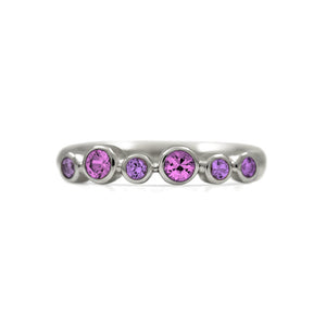Halo half eternity ring - sterling silver and pink sapphire