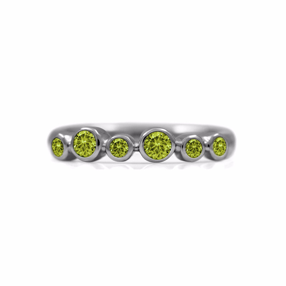 Halo half eternity ring - sterling silver and peridot