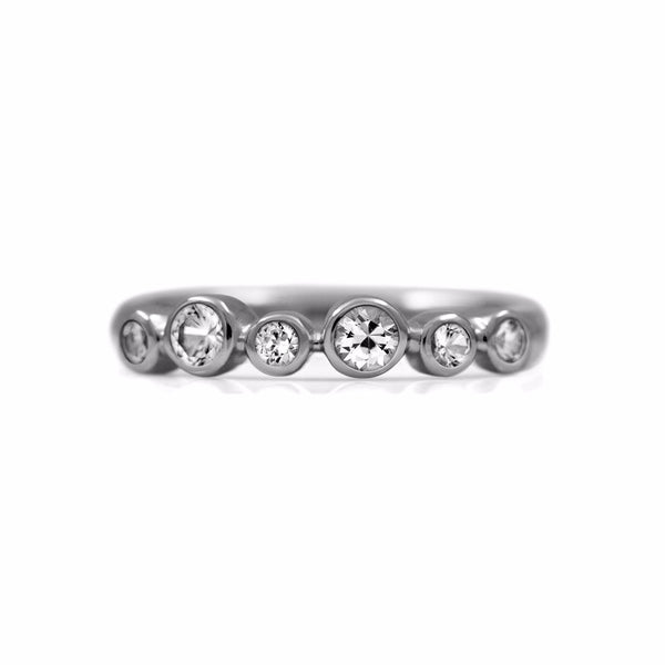Halo half eternity ring - sterling silver and white sapphire