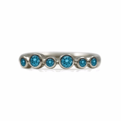 Halo half eternity ring - 9ct white gold and blue topaz