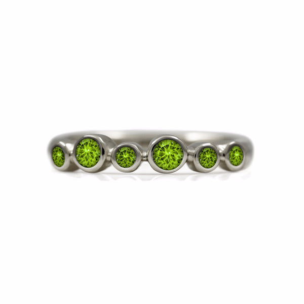 Halo half eternity ring - 9ct white gold and peridot