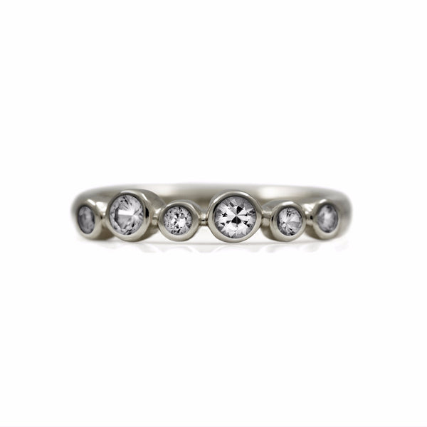 Halo half eternity ring - 9ct white gold and white sapphire