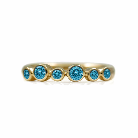 Halo half eternity ring - 9ct yellow gold and blue topaz
