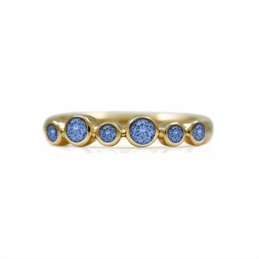 Halo half eternity ring - 9ct yellow gold and blue sapphire