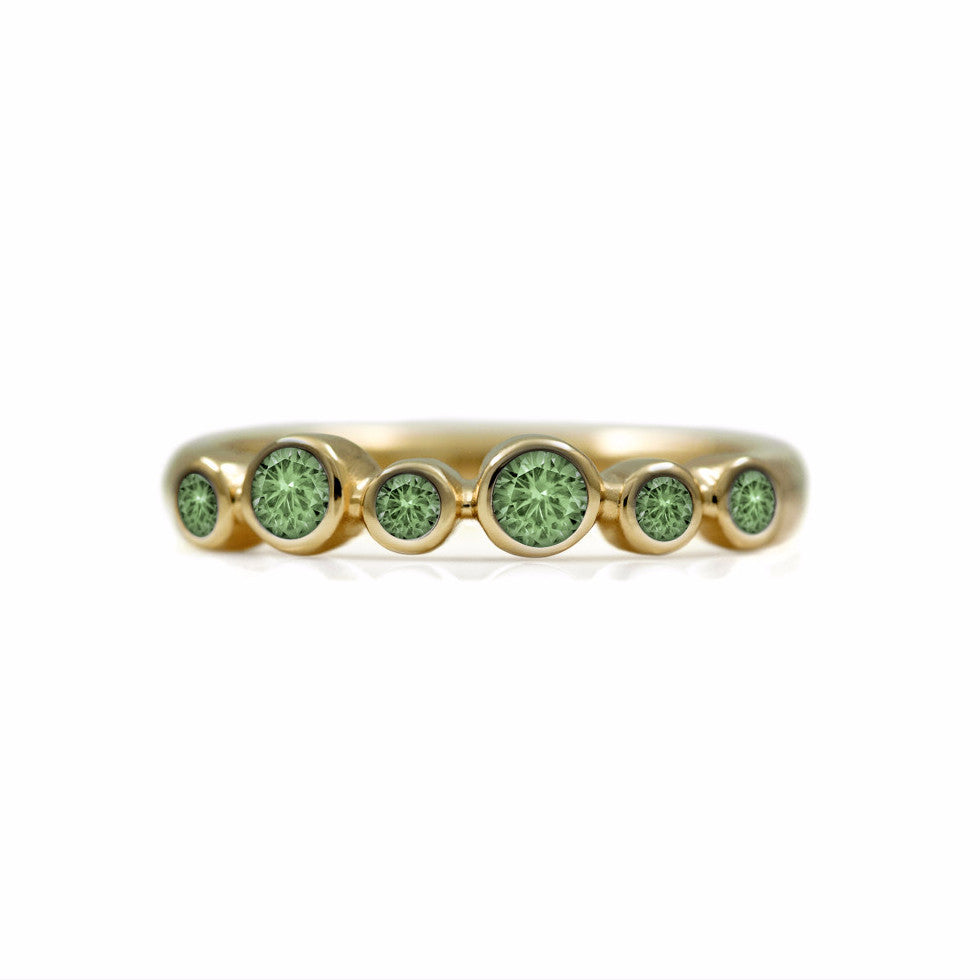 Halo half eternity ring - 9ct yellow gold and green sapphire
