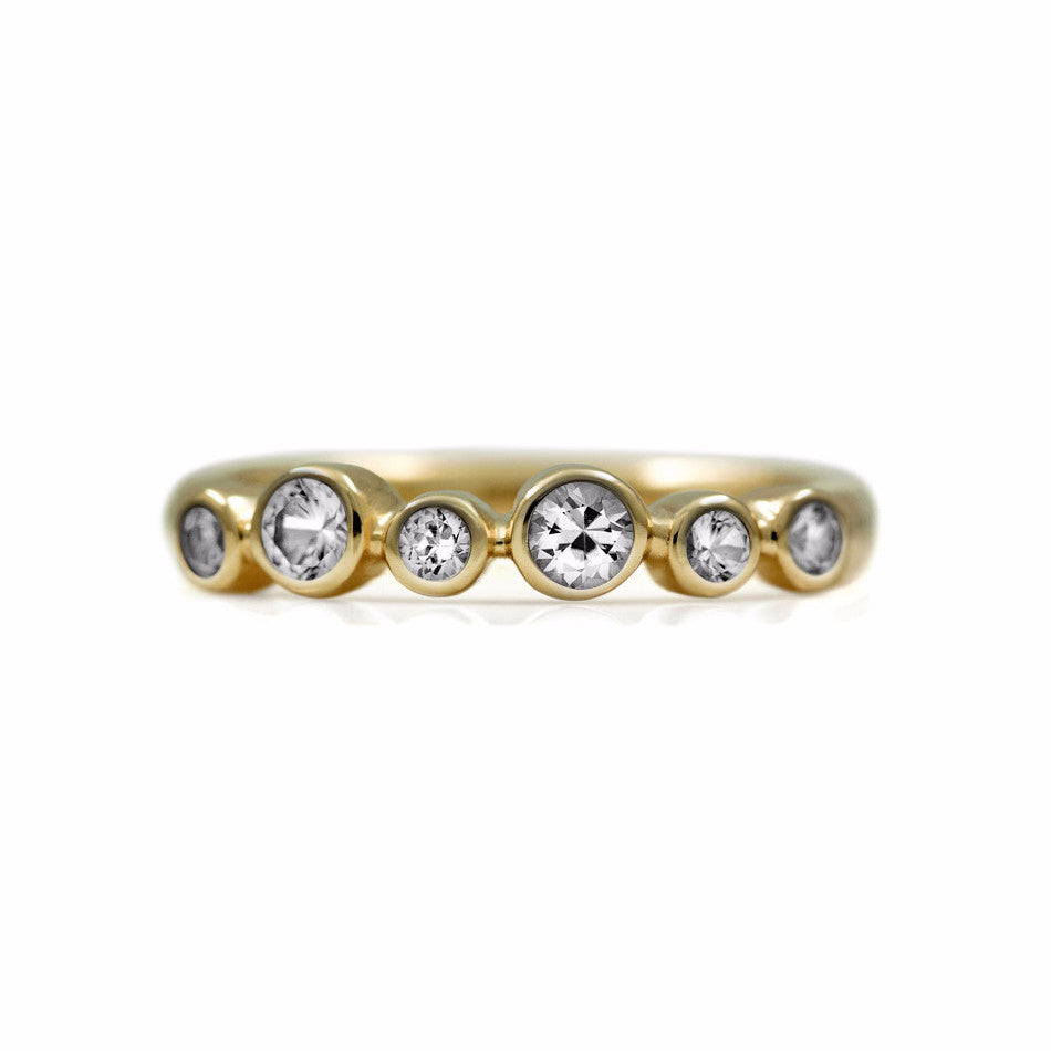 Halo half eternity ring - 9ct yellow gold and white topaz