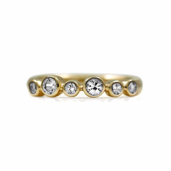 Halo half eternity ring - 9ct yellow gold and white topaz